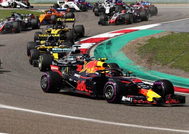 Max Verstappen leads Lewis Hamilton , but eventually finished fifth after being penalised ten seconds as a result of his collision with Sebastian Vettel. Picture: Getty.