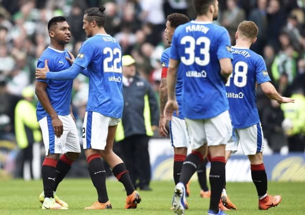 A furious Alfredo Morelos has words with Greg Docherty on the Hampden pitch at full-time. Picture: SNS