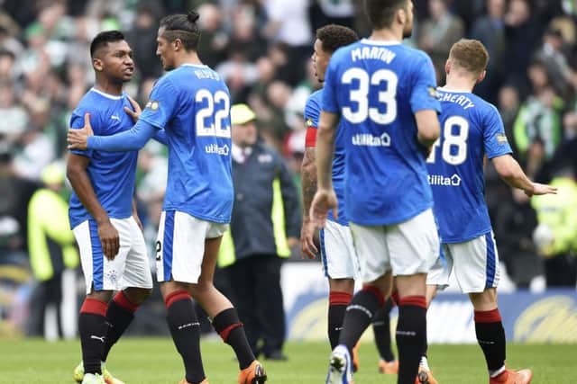 A furious Alfredo Morelos has words with Greg Docherty on the Hampden pitch at full-time. Picture: SNS