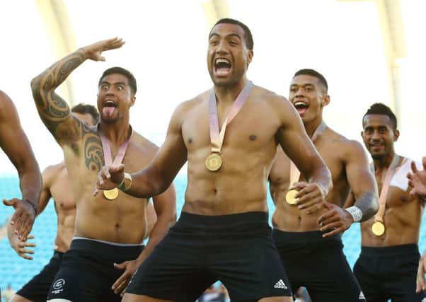 New Zealand's sevens team celebrate with a Haka after winning gold at the Commonwealth Games. Picture: Mark Kolbe/Getty Images