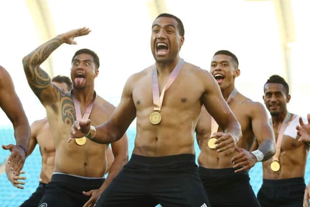 New Zealand's sevens team celebrate with a Haka after winning gold at the Commonwealth Games. Picture: Mark Kolbe/Getty Images