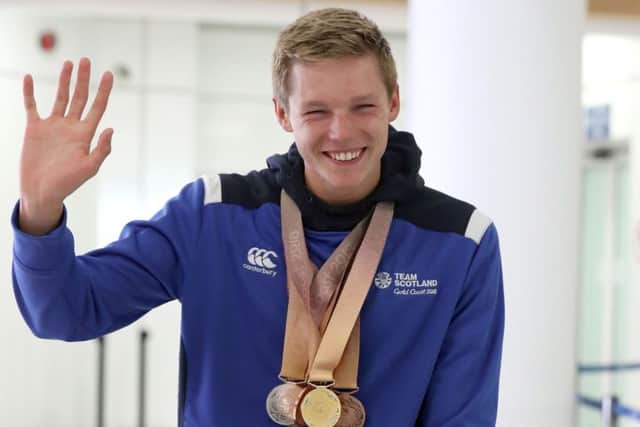 Swimmer Duncan Scott arrives at Glasgow Airport. Picture: Andrew Milligan/PA Wire