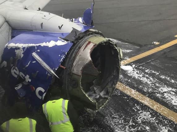 The engine after the emergency landing. (Amanda Bourman via AP)