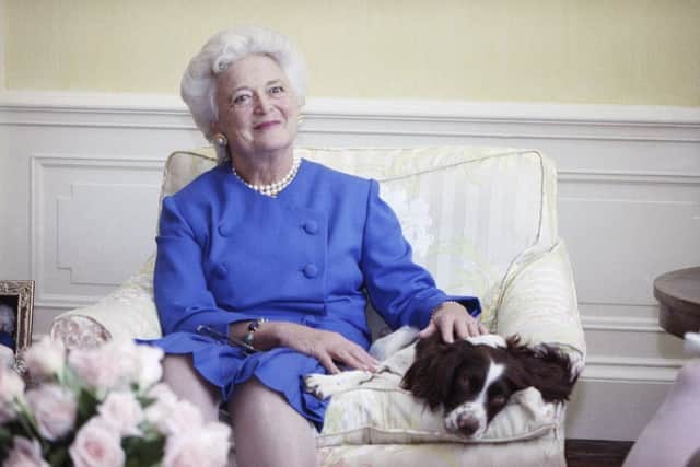 Former First Lady Barbara Bush poses with her dog Millie in Washington. A family spokesman said Tuesday, April 17, 2018, that former first lady Barbara Bush has died at the age of 92. Picture; AP
