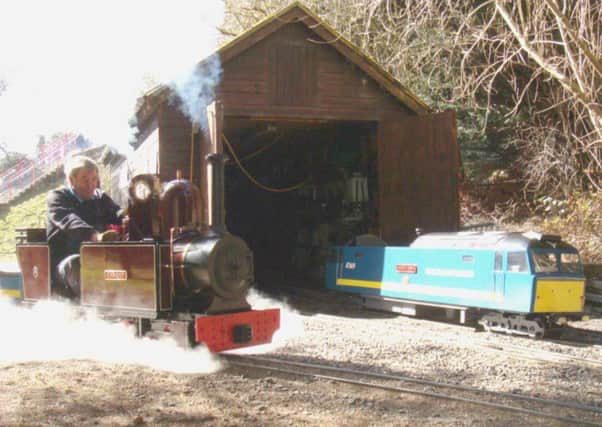 Ian Young at the controls of one of his miniature steam engines at Ness Islands Railway. PIC: Contributed.