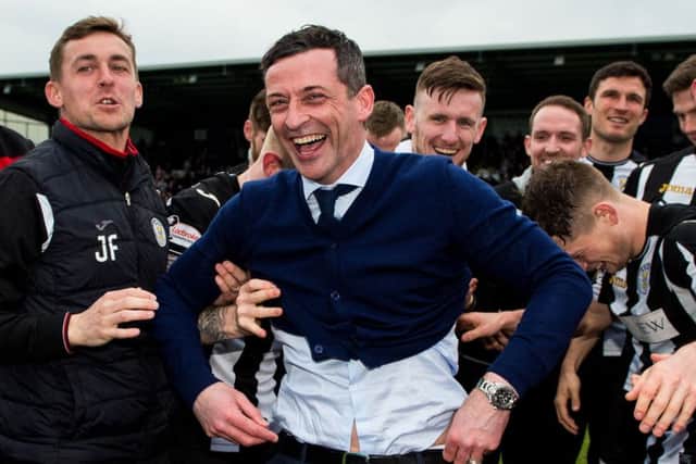 Jack Ross celebrates with his players as St Mirren win the Championship title. Picture: SNS