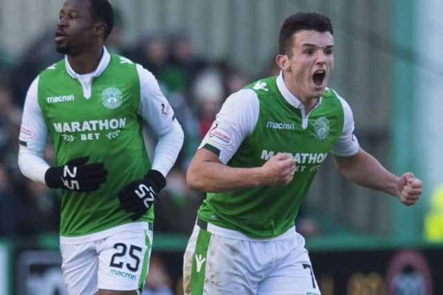 John McGinn celebrates Efe Ambrose's goal that put Hibs 2-1 ahead in the 2-2 draw at Easter Road in December.