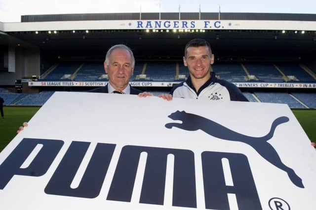 Former chief executive Charles Green and captain Lee McCulloch after Rangers agreed a deal with Puma in 2013. Picture: SNS