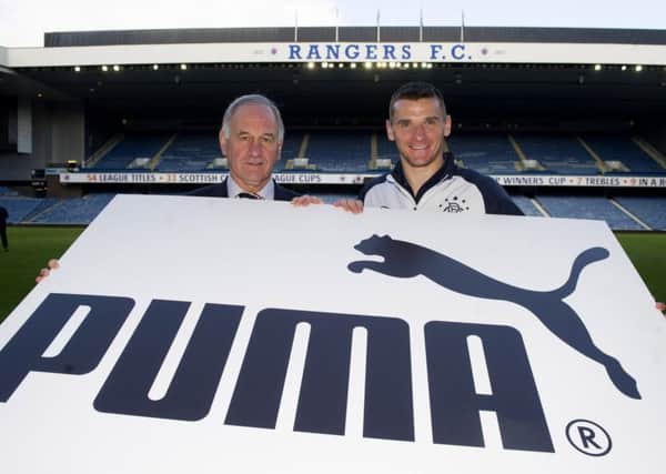 Former chief executive Charles Green and captain Lee McCulloch after Rangers agreed a deal with Puma in 2013. Picture: SNS