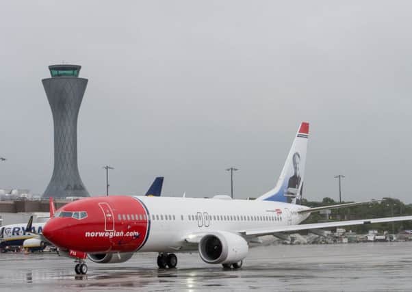 Norwegian Air has blamed air taxes in halting two of its three US routes from Edinburgh. Picture: Ian Georgeson