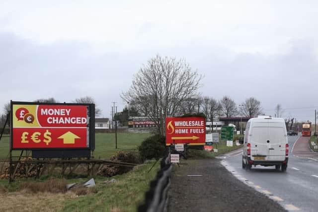A currency exchange sign at the border between the Republic of Ireland and Northern Ireland near the village of Killeen. Picture: Brian Lawless/PA Wire