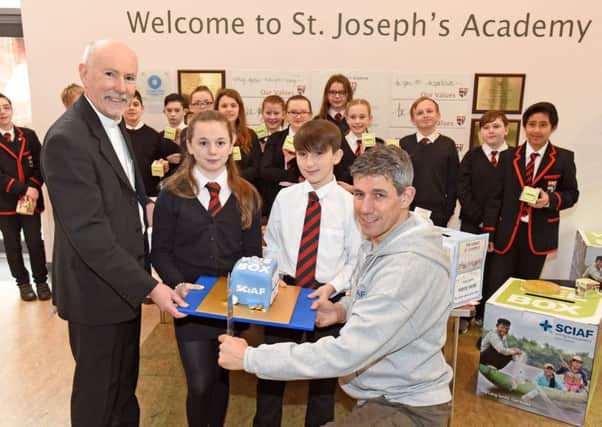 SCIAF WEE BOX Bishop William Nolan and Alistair Dutton with pupils from St Joseph's Academy Kilmarnock. Thursday 8th Feb 2018 Photo by Paul Mc Sherry SCIAF
