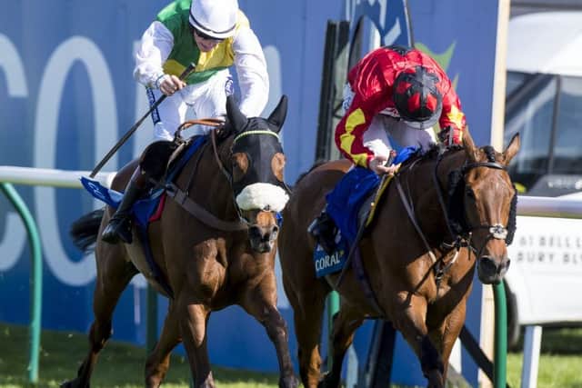 Vicente, ridden by Sam Twiston-Davies, wins last year's Coral Scottish Grand National. Picture: Craig Watson/PA