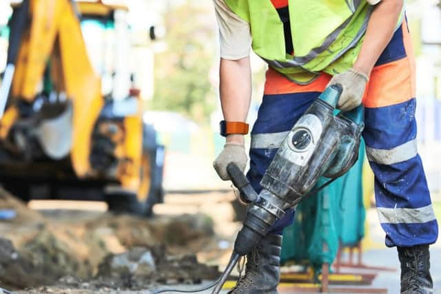 The device monitors in real time an individuals exposure to vibration when using power tools. Picture: Contributed