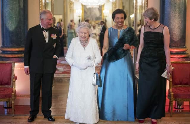 The Royals with Theresa May and Baroness Scotland of the Commonwealth (Victoria Jones/Pool Photo via AP)