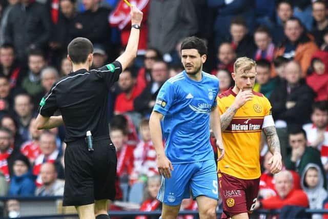 Aberdeen's Anthony O'Connor is booked during the Scottish Cup semi-final defeat by Motherwell. Picture: Craig Williamson/SNS