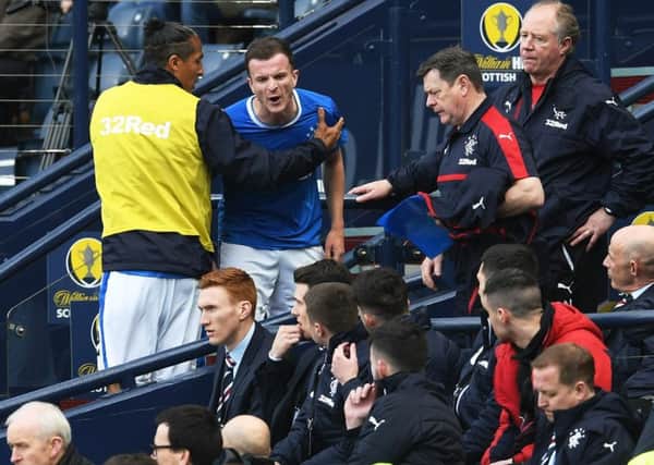 Rangers midfielder Andy Halliday, centre, shows his frustration after being substituted at Hampden. Picture: SNS