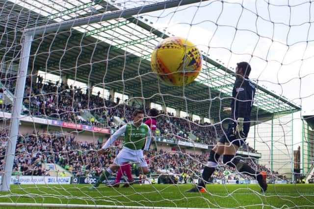 Hibs Jamie Maclaren opens the scoring on a day when everything went right for Neil Lennon. Picture: SNS.