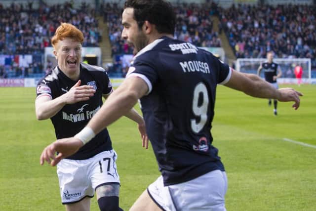 Simon Murray celebrates with Dundee's goal hero Sofien Moussa, who grabbed a double against St Johnstone. Picture: Kenny Smith/SNS
