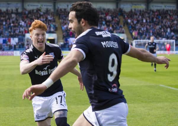 Simon Murray celebrates with Dundee's goal hero Sofien Moussa, who grabbed a double against St Johnstone. Picture: Kenny Smith/SNS