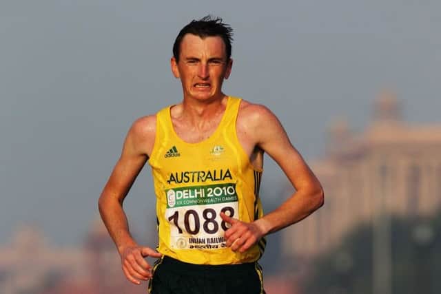 Australian Michael Shelley has been abused online after not stopping to help an ill Callum Hawkins en route to defending his Commonwealth Games marathon title