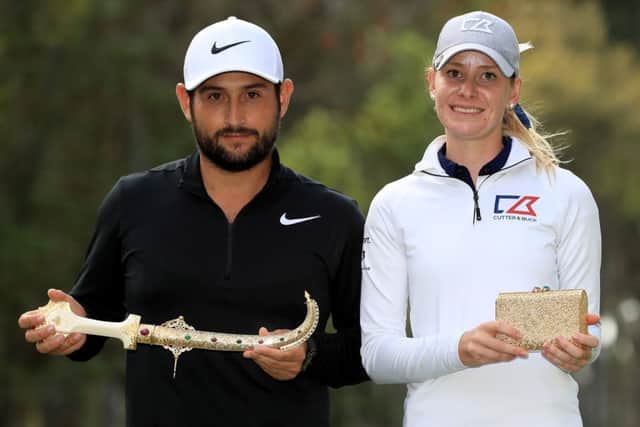 Alexander Levy of France and Jenny Haglund of Sweden with their winners prize. Picture: Getty.