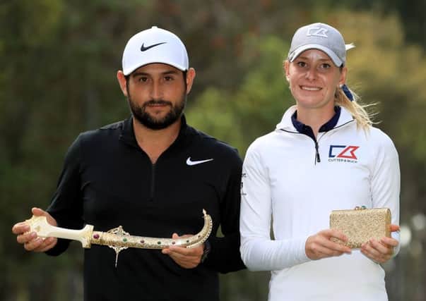Alexander Levy of France and Jenny Haglund of Sweden with their winners prize. Picture: Getty.