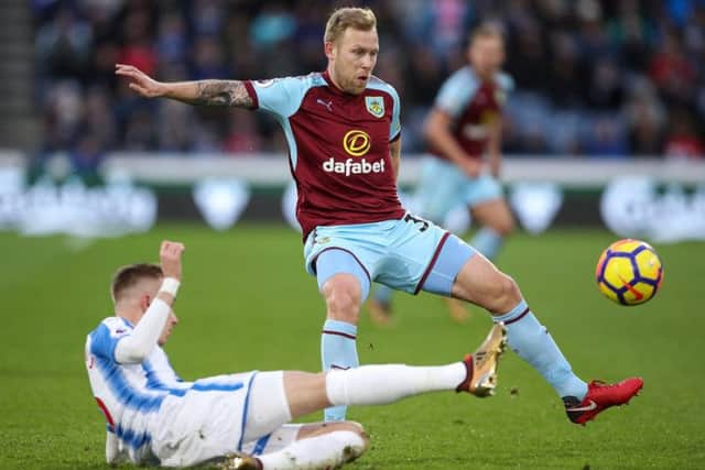 Scott Arfield in action for Burnley against former club Huddersfield. The former Falkirk midfielder is a reported target for Rangers. Picture: Getty Images
