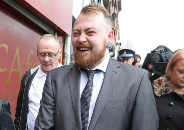 Mark Meechan leaves Airdrie Sherriff Court, with girlfriend Suzanne Kelly, where he was fined after being found guilty of a hate crime. Picture: Centre Press.