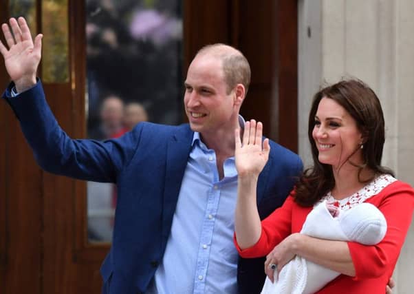 The Duke and Duchess of Cambridge and their new son greet the media outside hospital. Picture: AFP/Getty