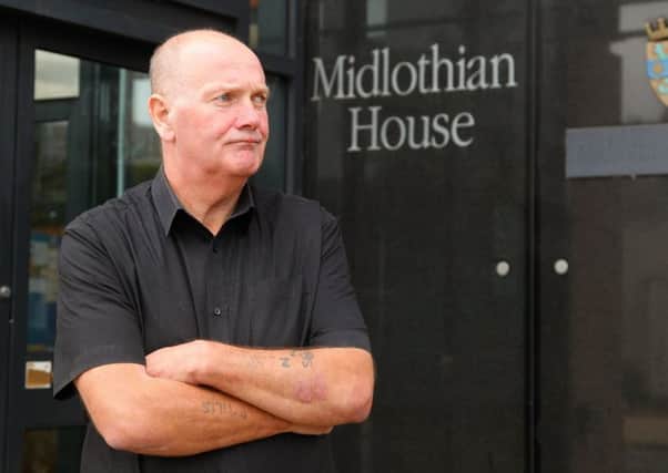 Councillor Derek Milligan outside Midlothian House in Dalkeith
