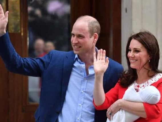 The Duke and Duchess of Cambridge greet the media with their new born son outside hospital