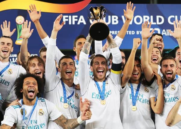 Real Madrid celebrate winning the 2017 Fifa Club World Cup after they defeated Brazilian club Gremio in the final in Abu Dhabi. Picture: Karim Sahib/AFP/Getty Images)