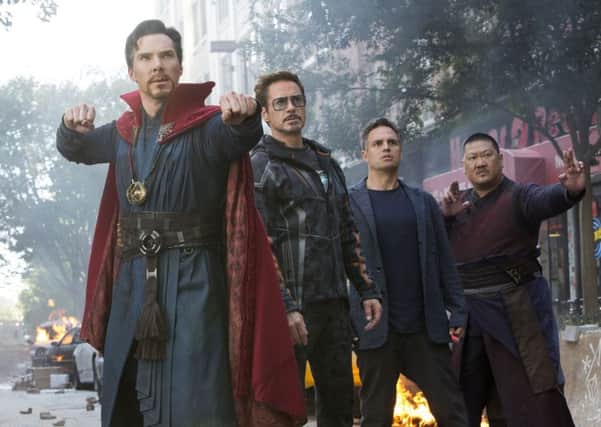 Benedict Cumberbatch, Robert Downey Jr., Mark Ruffalo and Benedict Wong in a scene from "Avengers: Infinity War." (Marvel Studios via AP)