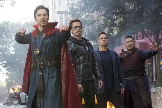 Benedict Cumberbatch, Robert Downey Jr., Mark Ruffalo and Benedict Wong in a scene from "Avengers: Infinity War." (Marvel Studios via AP)