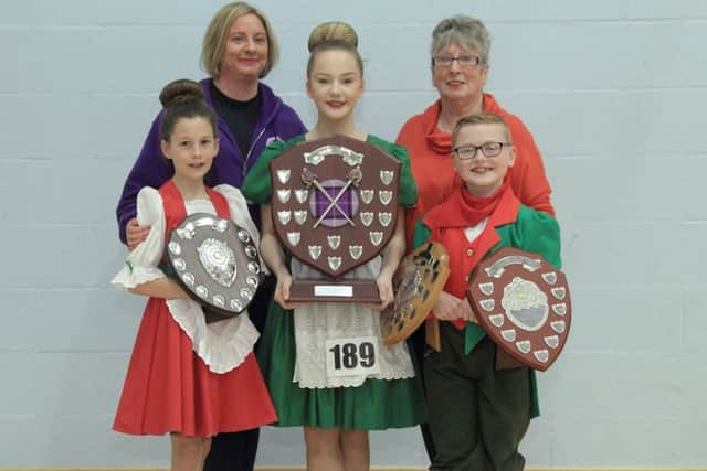 Teachers Kathryn Armstrong and Anne McIlroy with afternoon trophy winners ( L-R), Summer Leonard, Mollie-Mae Aiken and Harry Aiken