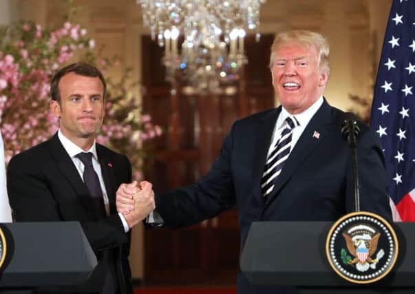 Emmanuel Macron criticised Donald Trump's policies during a speech to the US Congress (Picture: AFP/Getty)