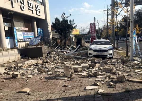 A damaged building is seen in Pohang 
Earthquake hits South Korea. Picture: REX
