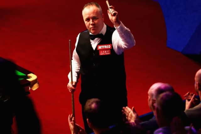 John Higgins celebrates after defeating Thepchaiya Un-Nooh. Picture: Getty
