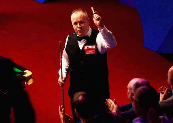 John Higgins celebrates after defeating Thepchaiya Un-Nooh. Picture: Getty