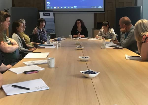 Labour MP for Midlothian Danielle Rowley (centre) at a Universal Credit summit in her constituency attended by charities, community groups and public sector organisations.