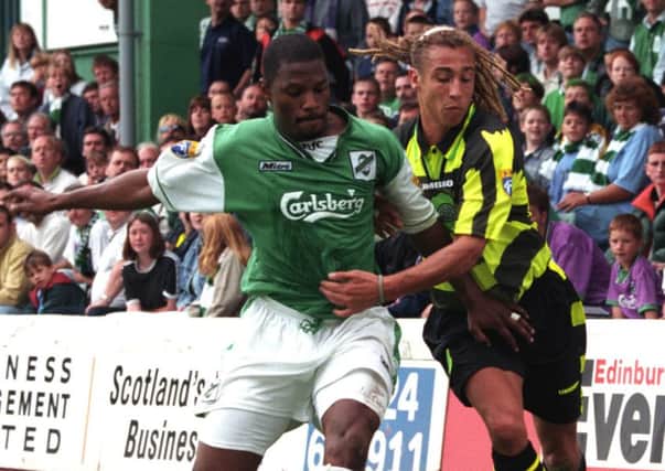 Henrik Larsson wearing the iconic 'bumblebee' kit on his debut against Hibs. Picture: SNS Group