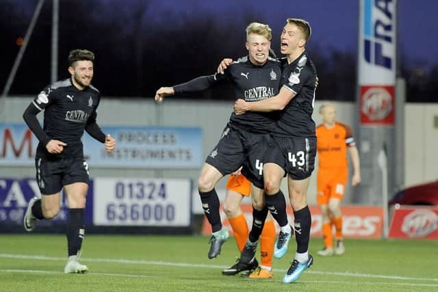 Tommy Robson (centre) and Lewis Kidd (left) have penned new deals. Picture Michael Gillen.