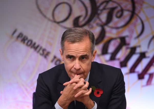 Bank of England governor Mark Carney may raise the rate but most banks and other providers are unikely to pass on full benefits to savers while raising costs for borrowers. Picture: PA