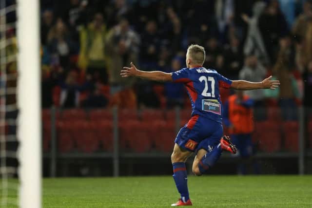 Riley McGree wheels away after scoring his sensational goal. Picture: Getty