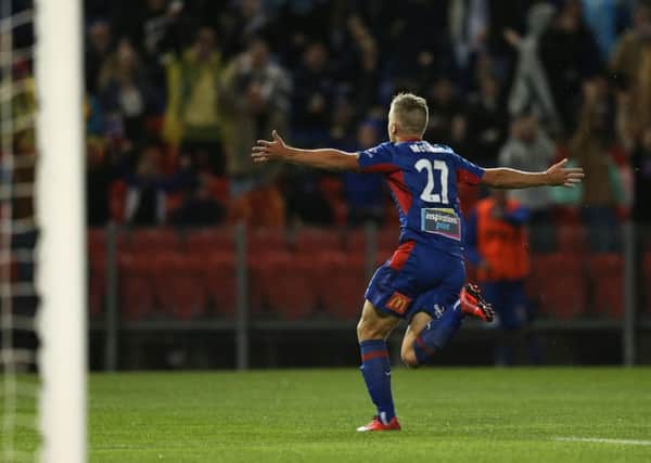 Riley McGree wheels away after scoring his sensational goal. Picture: Getty