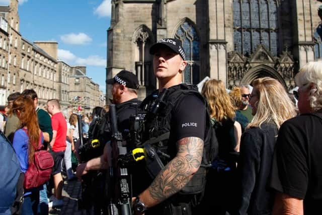 Armed officers will be sent to more incidents from next month. Picture: John Devlin