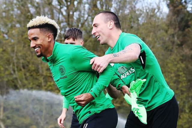 Scott Sinclair and Scott Brown look relaxed in training ahead of Celtic's game with Rangers. Picture: Ian MacNicol/Getty Images