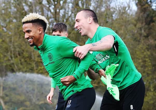 Scott Sinclair and Scott Brown look relaxed in training ahead of Celtic's game with Rangers. Picture: Ian MacNicol/Getty Images