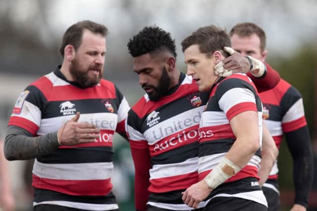 Niko Matawalu, centre, congratulates try scorer Kerr Gossman during Stirling County's 51-19 semi-final win over Hawick. Picture: SNS